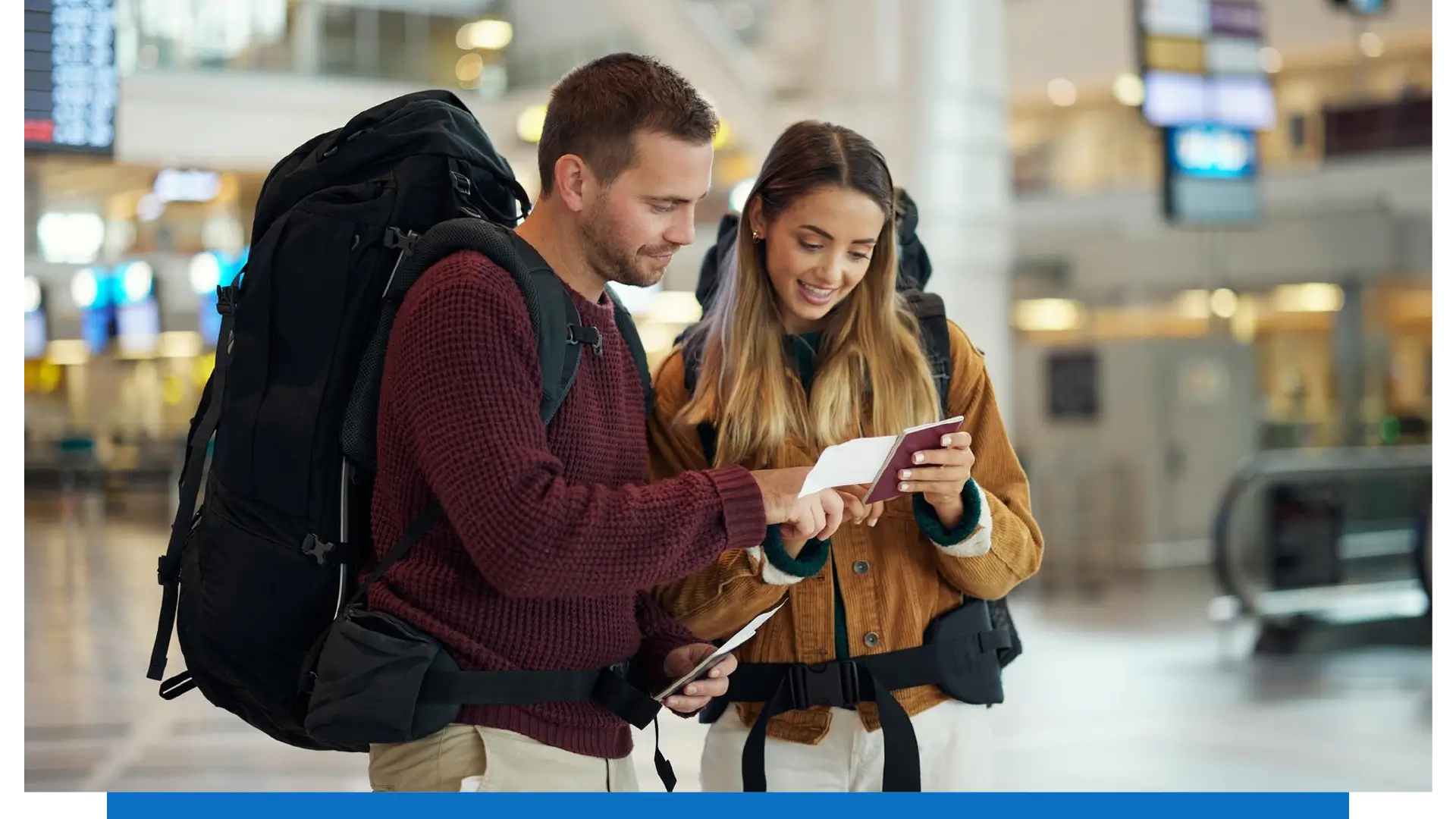 two travelers in the airport